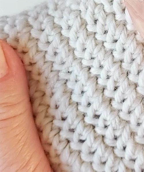 Single crochet variation in the round in white yarn